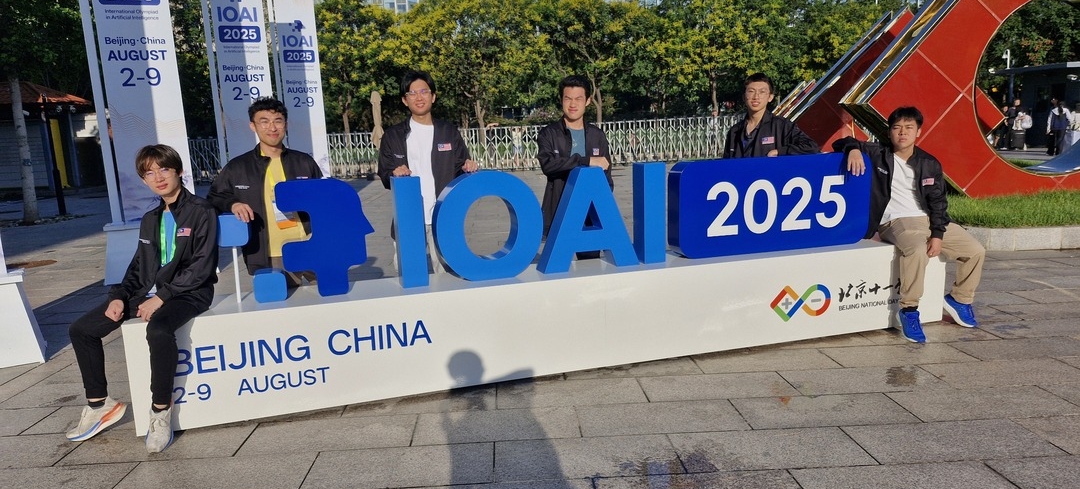 Team Malaysia 2025 taking a boy band-style photo