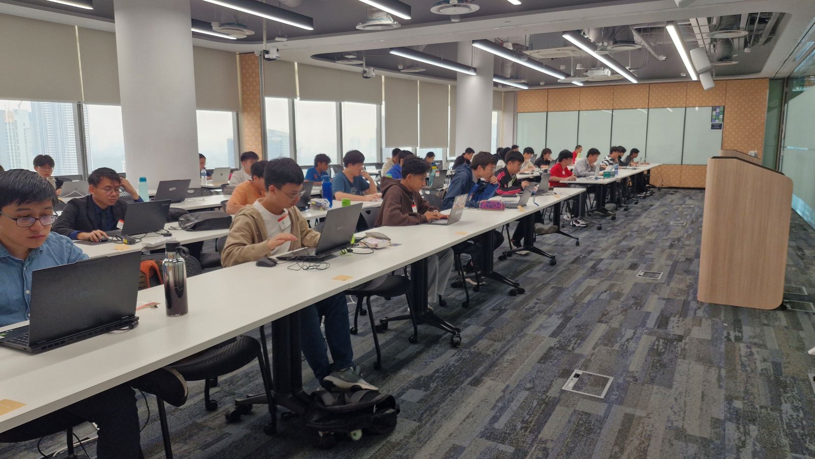 Students quietly taking MAIO 2026 at their desks