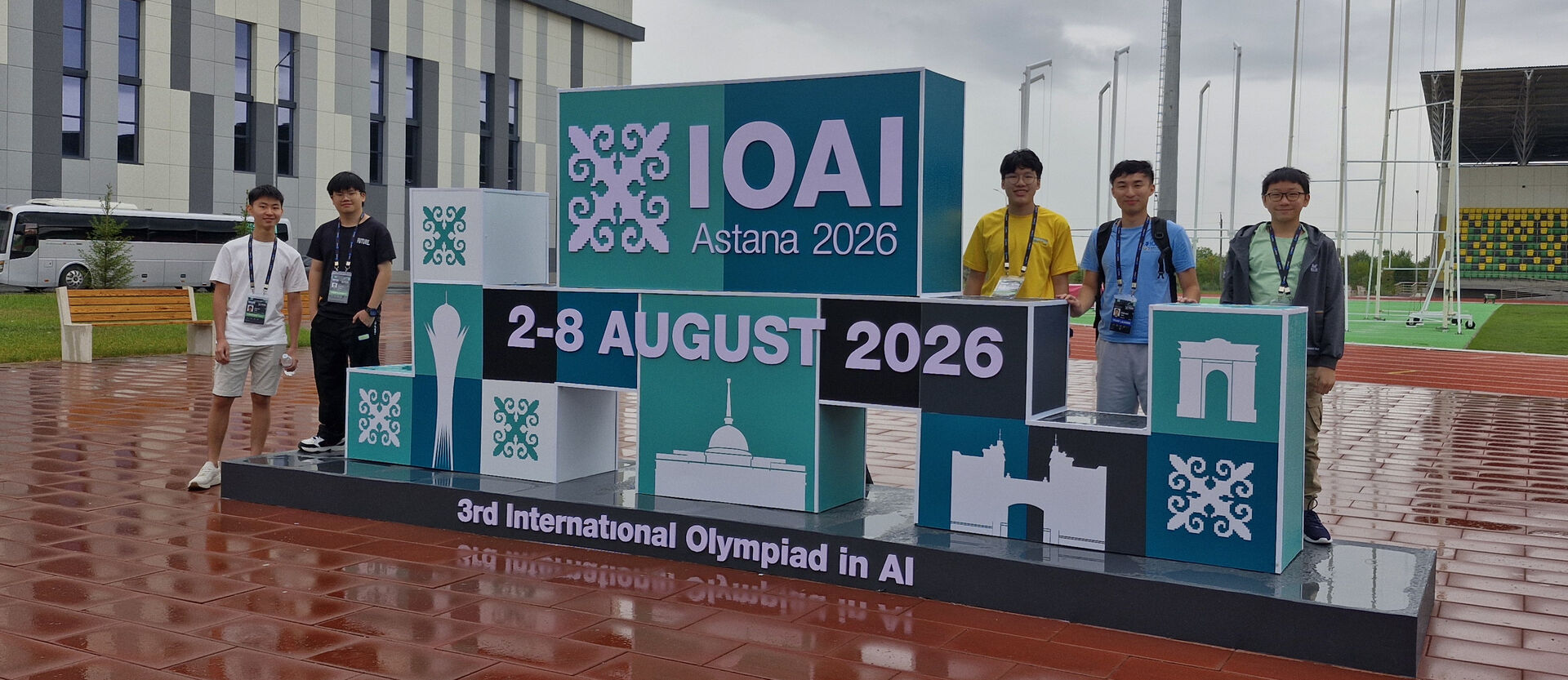 Malaysian IOAI 2026 team posing with IOAI plaque cover