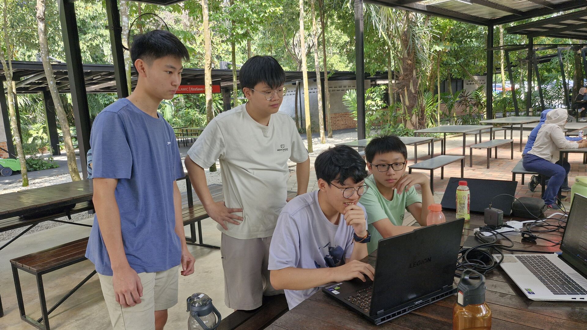 2026 Malaysian IOAI team working together on a task during training camp